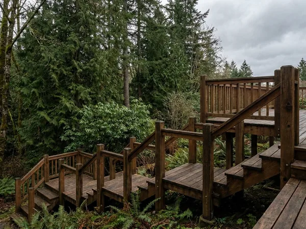Elevated multi-level deck on a hillside lot, example